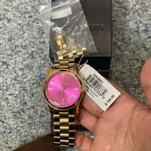 Gently worn Michael Kors good watch with pink face Amazon.com: Michael Kors Runway Chronograph Blush Acetate  main image 3